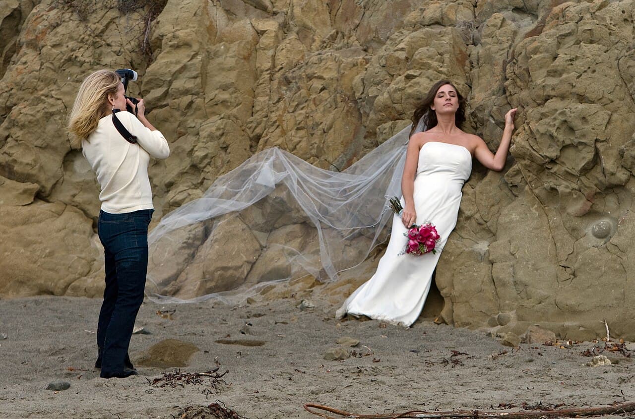 Wedding photographer preparing a shot of a couple