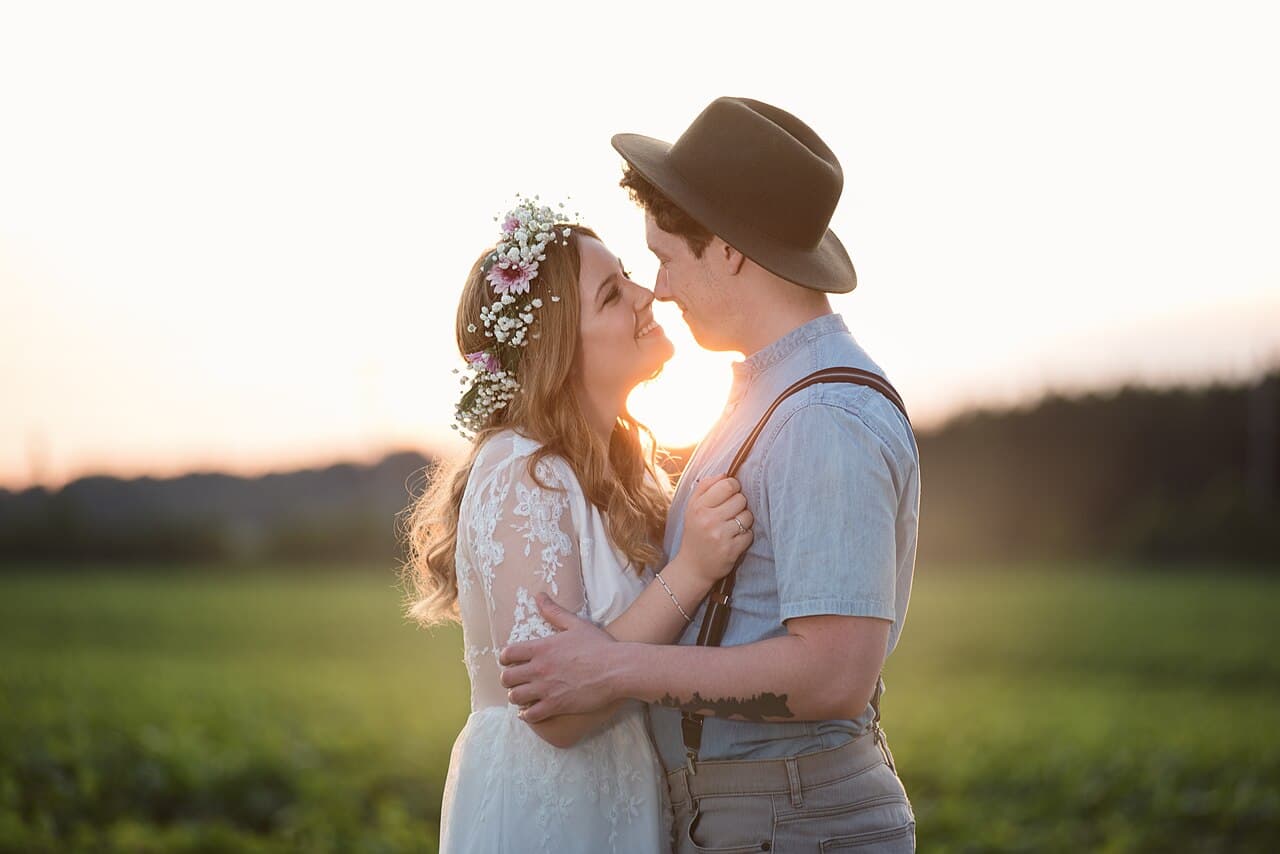 Couple smiling together at sunset